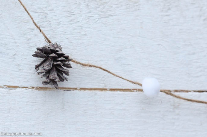 DIY Pom Pom & Pine Cone Garland for the holidays by thehappyhousie.com for Classy Clutter-3