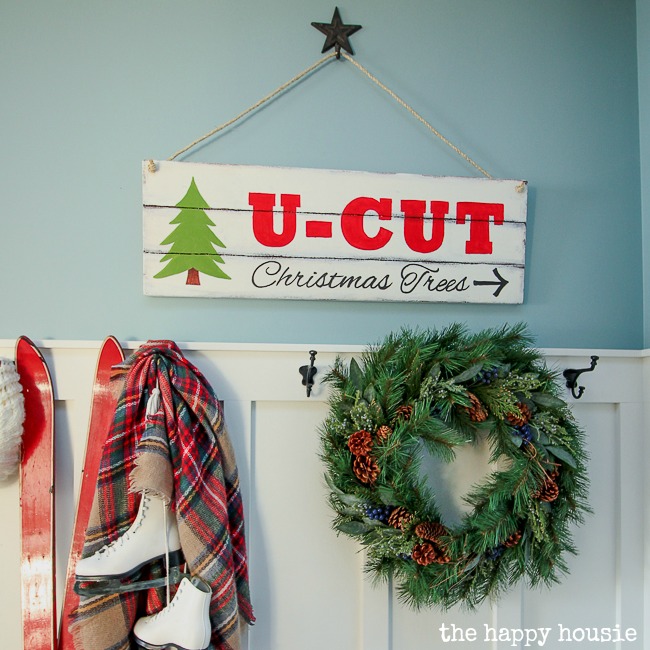 U-Cut Christmas Trees sign above the coat hooks in the hallway.