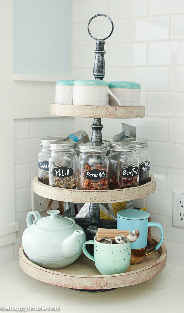 https://thehappyhousie.porch.com/wp-content/uploads/2017/01/Tiered-Trays-in-the-Kitchen-a-Tiered-Tea-Tray-tea-station-9.jpg